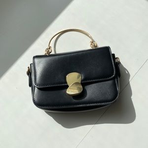 Black abstract shape faux leather mini purse